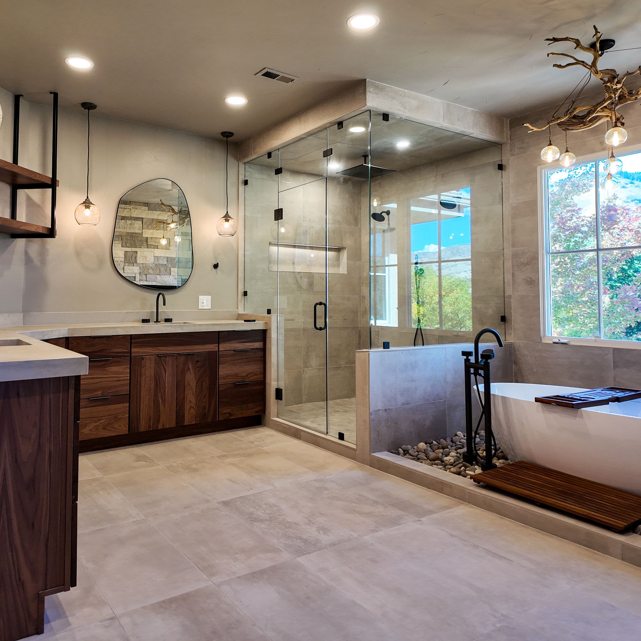 Full bath remodel completed by Next Step Innovations with stone flooring